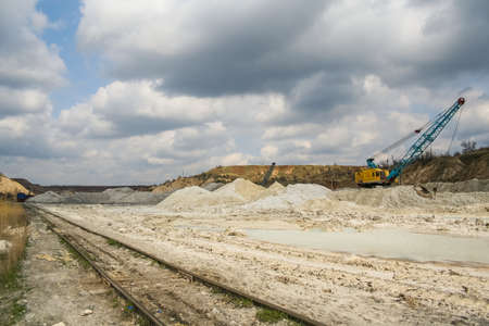 Rotary excavator in kaolin quarry. Zaporozhye region, Ukraine. November 2012の写真素材