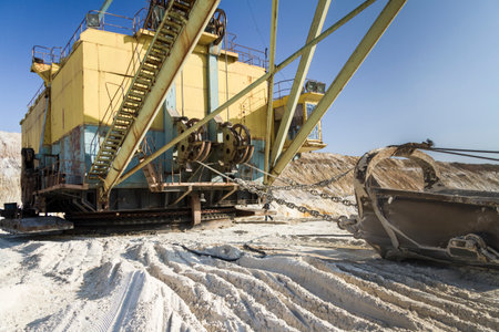 A walking dragline excavator performs overburden stripping in a clay pit. Zaporizhia region, Ukraine. January 2015の写真素材