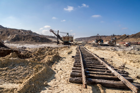 Temporary mobile railway track for mining in a clay quarry. Zaporizhia region, Ukraine. March 2015の写真素材