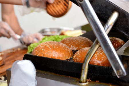 street food, fresh burgers cooked outdoorsの写真素材