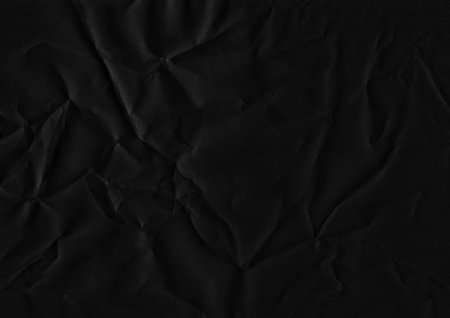Folded paper texture. Folded black paper texture background. High resolution texture. Folded black...