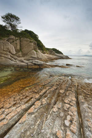 Russian Primorye seabank.The mysterious island in the blue seaの写真素材