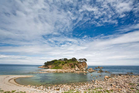 The mysterious island in the blue seaの写真素材