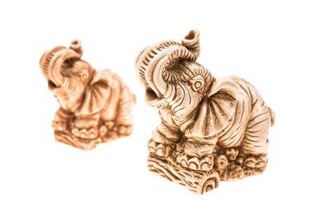two ceramic elephant on a white backgroundの写真素材