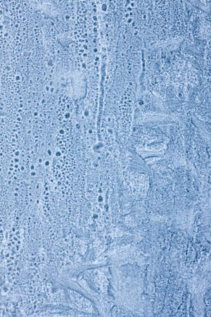 beautiful frosty morning drawing on a window pane