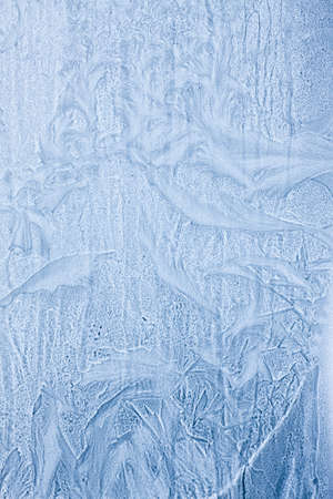 beautiful frosty morning drawing on a window pane