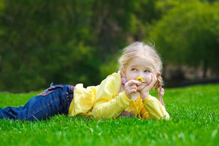 little girl playing on the playgroundの写真素材