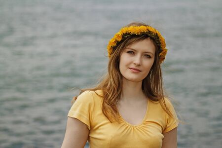 beautiful blonde walks by the seaの写真素材