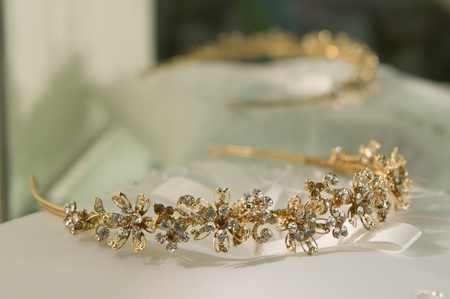 gold wedding tiara on a pillowの写真素材