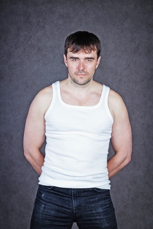 brutal man with a gray backgroundの写真素材