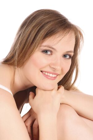 portrait of a beautiful girl with brown hair on white backgroundの写真素材