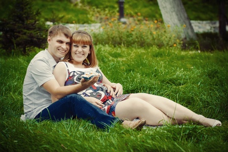beautiful young family expecting a babyの写真素材