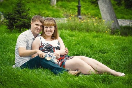 beautiful young family expecting a babyの写真素材