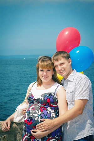 portrait of a beautiful young family in natureの写真素材