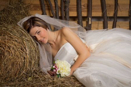 portrait of a young bride in the village studioの写真素材