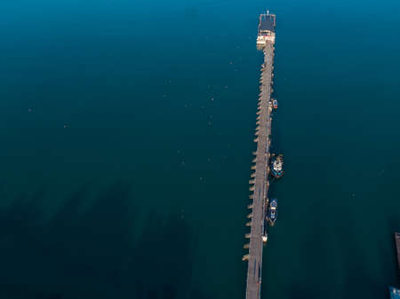 Pier on the sea coast, aerial viewの写真素材