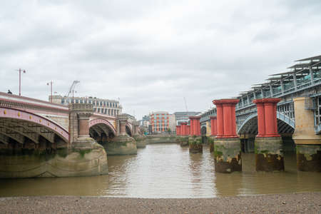 London, UK - October 2019: Between Blackfriars Bridge and Blackfriars Railway Bridgeのeditorial素材