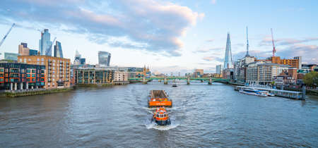 London - October 2019: Thames, Southwark Bridge, City of London and The Shardのeditorial素材