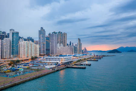 Hong Kong, China - 2020: Central and Western District Promenade at sunset from above.