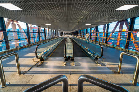 Moscow, Russia - 2020: Sheremetyevo International Airport, a empty travelator, in the bridge between...