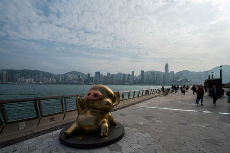 Hong Kong - 2020: Pig McDull cartoon character statue on Avenue of Stars.のeditorial素材