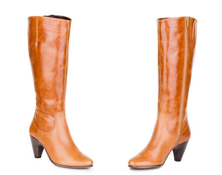 Classic brown red yellow sandy glossy leather high knee ankle heels warm winter comfort female woman women boots. Two isolatedの写真素材