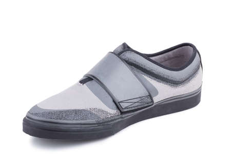 One fiber fabric leather laced breathing orthopedic casual sneakers shoe isolated on white backgroundの写真素材