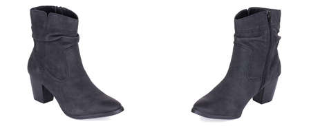 Pair of classical black woman high ankle cowboy suede boots shoes. Two isolated.の写真素材