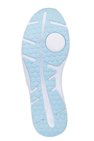 Sole of sport tracking shoes snickers individual design close up isolated one stylish blue and white patternの写真素材