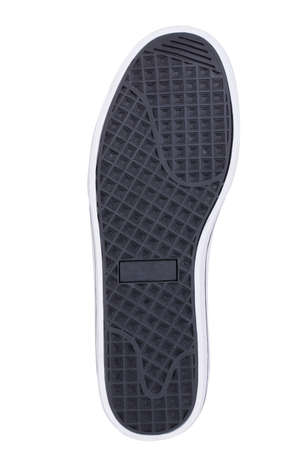 Sole of sport tracking shoes snickers individual design close up isolated one black and whiteの写真素材