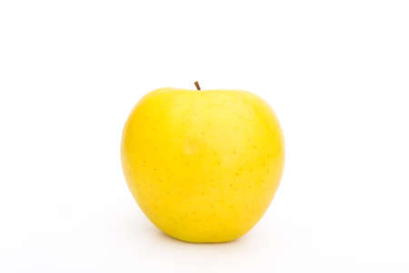 Fresh yellow fairytale perfect apple Isolated on white backgroundの写真素材