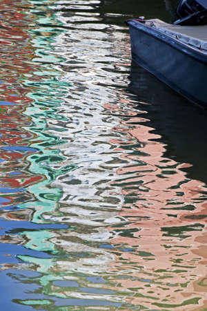Colorfull homes line the canals in Burano an island near Venice Italyの写真素材