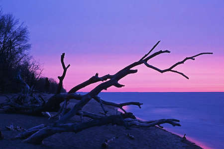 Sunrise over Lake Erie from Point Prlee National Park, Ontario Canadaの写真素材