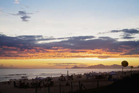 Sunset along Barra da Tijuca Beach in Rio de Janeiro in Brazilの写真素材