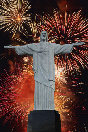 Christ The Redeemer statue sits atop the Corcovado mountains overlooking the city of Rio de Janeiro in Brazilのeditorial素材