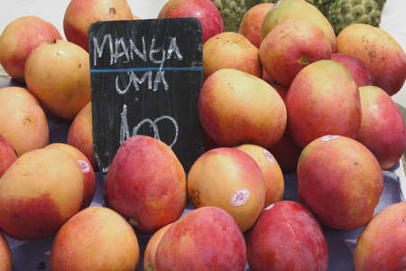 Mangos for sale in a street market in Rio de Janeiro, Brazilの写真素材