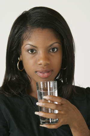 Model Release #278  African American Woman in early 20's drinking waterの写真素材