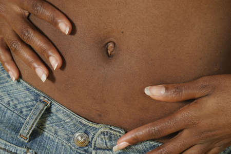 Model Release #278  African American Woman with hands on midsectionの写真素材