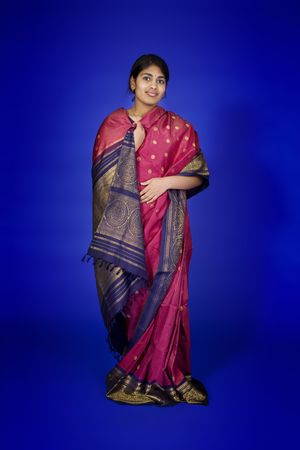 Beautiful Hindu teenager dressed in a traditional Sari dress