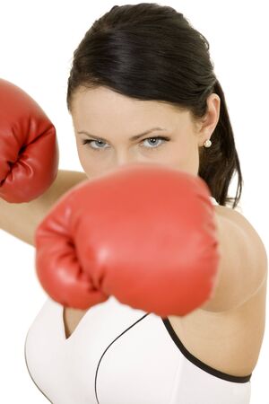 Beautiful Caucasian woman working out with boxing glovesの写真素材