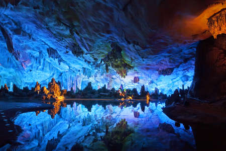 The beautifully illuminated Reed Flute Caves displaying the の写真素材