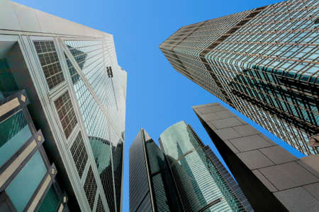 Skyscrapers rising up into the sky in the financial district of Hong Kong Island. Hong Kong. Chinaの写真素材