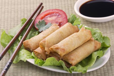 Traditional Chinese Spring Rolls with a dipping sause of soy sause