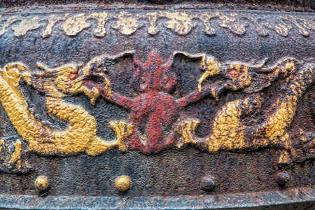 Close up details of the many dragons that decorate the Qingyang Temple in Chengdu, Sichuan province, Chinaの写真素材