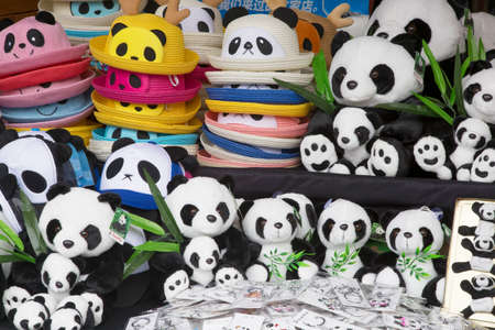 Chengdu China, March 31, 2017 Souvenirs of stuffed panda bears and hats for sale along the famous Kuanzhai Alleys in Chengdu, Sichuan province, Chinaのeditorial素材