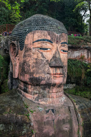 Leshan, China, April 3, 2017  The Leshan Giant Buddha is a 71-meter, 233 ft tall stone statue. Built between 713 and 803 during the Tang Dynasty. It is carved out of a cliff face that lies at the confluence of the Minjiang, Dadu and Qingyi rivers in the sのeditorial素材