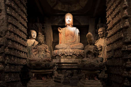 Stone Buddha and relics from the Zhongshan Grottoes in Zichang County displayed at the Shaanxi History Museum in Xian, Shaanxi Province in Chinaのeditorial素材