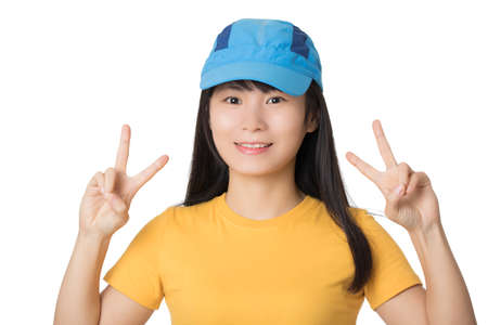 Portrait of a Beautiful Chinese American woman displaying a bit of attitude isolated on a white backgroundの写真素材