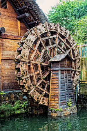 Ancient waterwheel In the Nan Lian Garden, Chi Lin Nunnery, Hong Kong, China