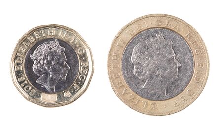 Obverse sides of both the British One and Two pound coins isolated on a white background